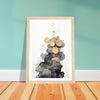 Black clouds and gold circles art print in a light wood frame, A4