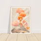 Volcano with orange smoke art print in a light wood frame, 45x60 cm