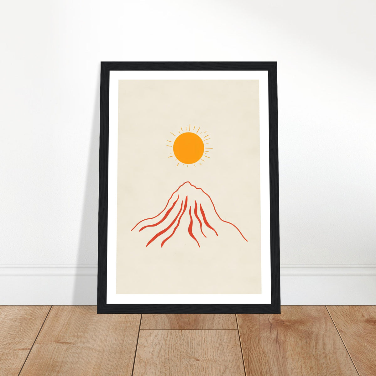 Orange sun over red mountain art print in a black wood frame, A4